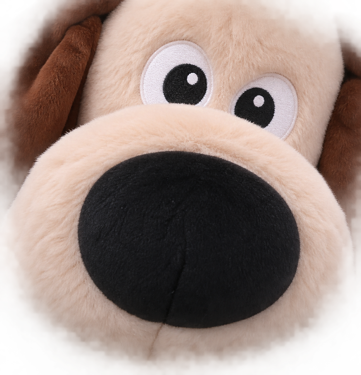 A giant plush dog face staring from inside the elevator